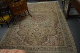 A Persian design rug, beige ground with all-over floral decoration, 310cm x 210cm.