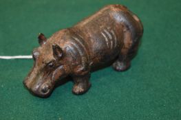 A small cast bronze model of hippo.