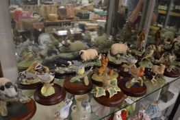 A group of decorative porcelain animals and birds.