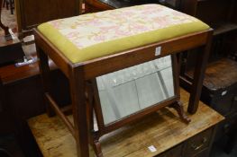 Two stools and a dressing table mirror.