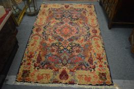 An unusual Persian design rug with all-over stylised floral decoration, 205cm x 125cm.