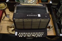 A Hohner accordion.