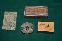 Four small trinket boxes.