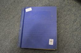 A stamp album and contents.