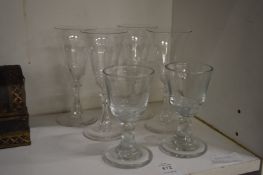 A set of four cut glass liqueur glasses and a pair of miniature rummers.