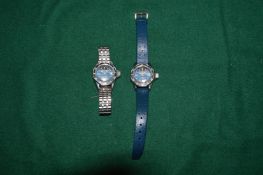 Two ladies Marine Star wristwatches, one with stainless steel strap the other with a leather strap.
