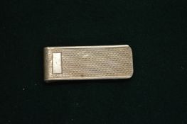 A silver money clip.