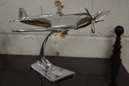 An aluminium model of a spitfire.