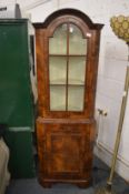 A good reproduction walnut standing corner cabinet.