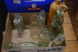 A collection of old glass bottles.