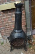 A cast iron chiminea.