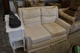 Two seater settee and matching armchair.