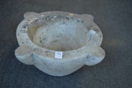 A marble mortar.