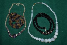 Decorative bead necklaces.