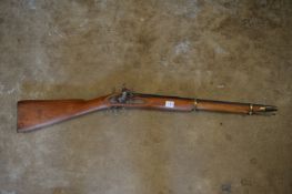 A reproduction percussion rifle.
