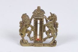 A ROYAL COAT OF ARMS THERMOMETER.