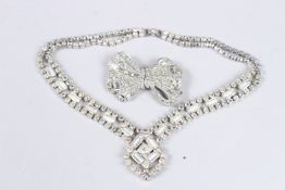 A GOOD DIAMANTE NECKLACE AND BOW BROOCH.