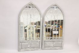 A PAIR OF GOTHIC DESIGN MIRRORED DOORS. 4ft 6ins high x 2ft 2ins wide.