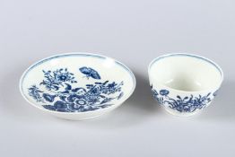 A WORCESTER TEA BOWL AND SAUCER, Circa 1775. Flowers and Butterflies.