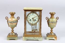 A GOOD 19TH CENTURY FRENCH ONYX AND CLOISONNE ENAMEL THREE-PIECE CLOCK SET. Clock 10ins high, with a