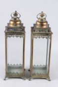 A PAIR OF METAL SQUARE LANTERNS. 21ins high.