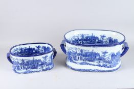 TWO BLUE AND WHITE POTTERY FOOT BATHS. 16ins and 12ins wide.