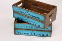 A PAIR OF CHAMPAGNE WOODEN BOXES. 1ft 5ins long.