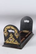 A VICTORIAN COROMANDEL AND BRASS MOUNTED SLIDING BOOK RACK set with hardstones.