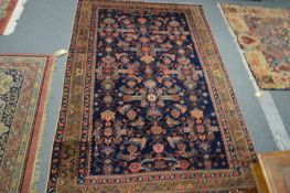 A GOOD PERSIAN DESIGN RUG, blue ground with stylized decoration, 198cm x 133cm.