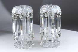 A GOOD PAIR OF GLASS LUSTRES with prism drops. 10ins high.