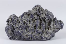 A LARGE CARVED LAPIS BOULDER. 14ins x 9ins.