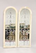 A PAIR OF PAINTED MIRRORED DOORS. 4ft high x 1ft 4ins wide.