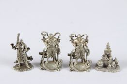 FOUR CHINESE WHITE METAL FIGURES.