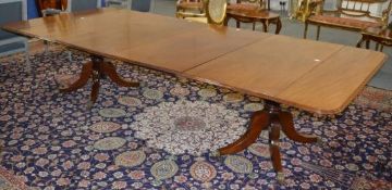 A VERY GOOD 19TH CENTURY TWIN PILLAR DINING TABLE, each rectangular pedestal section having a single