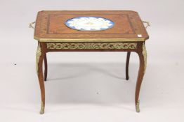 A GOOD 19TH CENTURY COFFEE TABLE inset with a Sevres porcelain plaque, supported on curving legs.