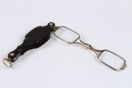 A FOLDING LORGNETTE.