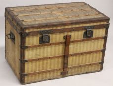 LOUIS VUITTON. A good large travelling trunk, circa 1880, covered with cream and brown striped