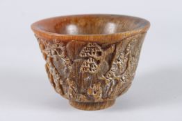A GOOD CHINESE CARVED HORN BOWL. 3ins high.