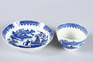 A WORCESTER TEA BOWL AND SAUCER, "The Fisherman and Cormorant", Circa 1775 - 1780.