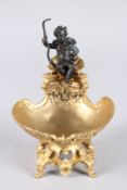A GOOD ORMOLU AND BRONZE CHERUB SALT. 7.5ins high.