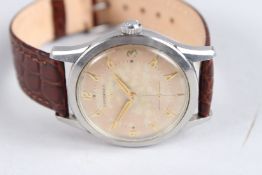 A 1940 - 1950 LONGINES WRISTWATCH with leather strap.