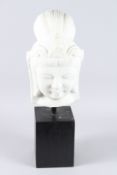 A CARVED WHITE MARBLE GUANYIN HEAD. 17ins high, on a stand.