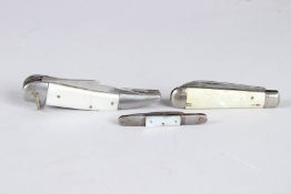 A JAPANESE STAINLESS STEEL PENKNIFE and two other penknives (3).