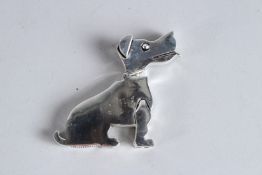 A SILVER PLATED DECO DOG VESTA.