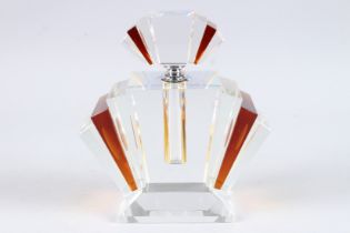 A LARGE ART DECO DESIGN AMBER COLOUR SCENT BOTTLE. 9ins high.