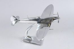 A CHROME SPITFIRE. 11ins long.