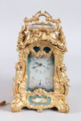 A CAST GILT BRONZE SEVRES DESIGN REPEATER CARRIAGE CLOCK. 9ins high.