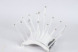 A CHRISTOPHER DRESSER DESIGN TOAST RACK.