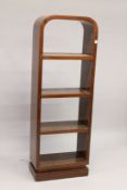 AN ART DECO DESIGN SET OF STANDING SHELVES. 5ft 8ins high x 2ft wide.