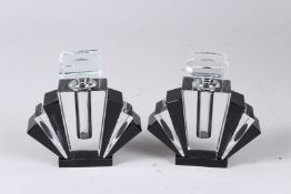 A PAIR OF SMALL DECO FAN SHAPED SCENT BOTTLES AND STOPPERS.